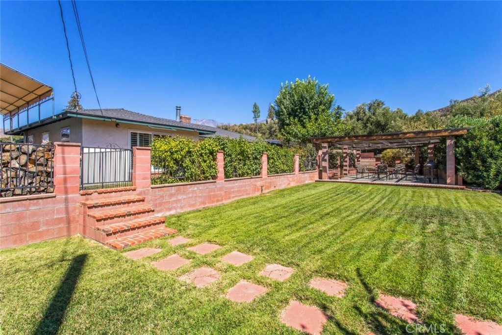 35893 Cornell Drive Yucaipa, CA 92399 - Photo 38 of 39 a view of a house with a yard