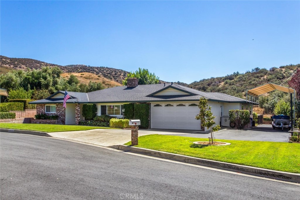 35893 Cornell Drive Yucaipa, CA 92399 - Photo 4 of 39 a view of a house with swimming pool and a yard