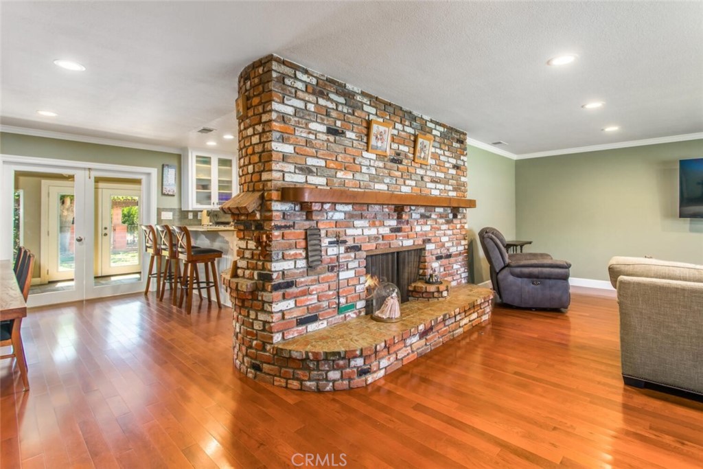 35893 Cornell Drive Yucaipa, CA 92399 - Photo 5 of 39 a living room with furniture and a wooden floor