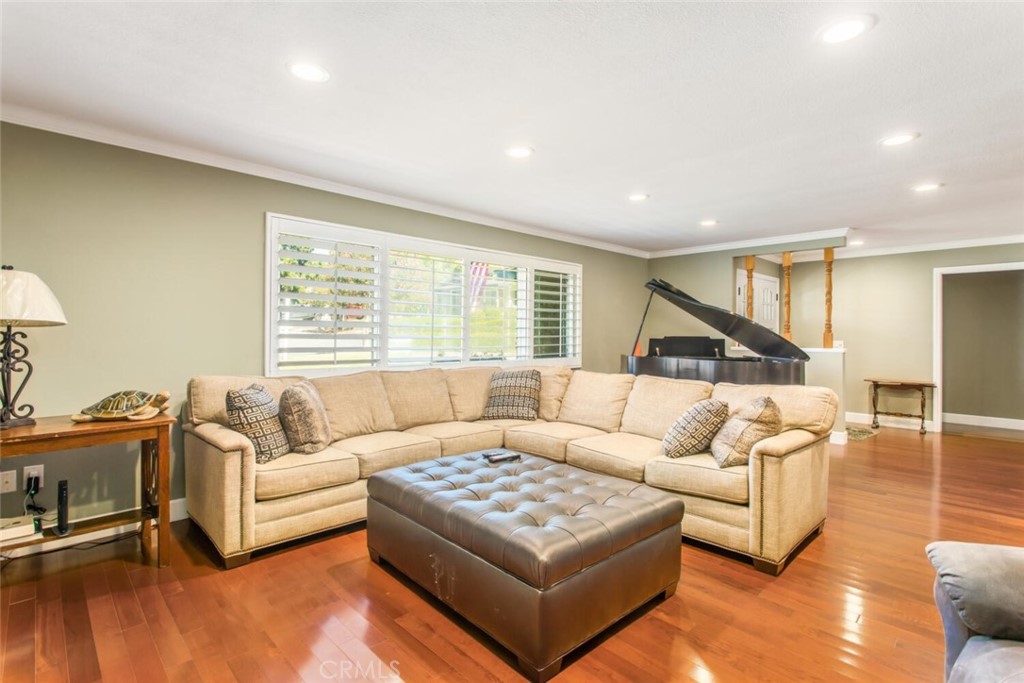 35893 Cornell Drive Yucaipa, CA 92399 - Photo 8 of 39 a living room with furniture and a large window