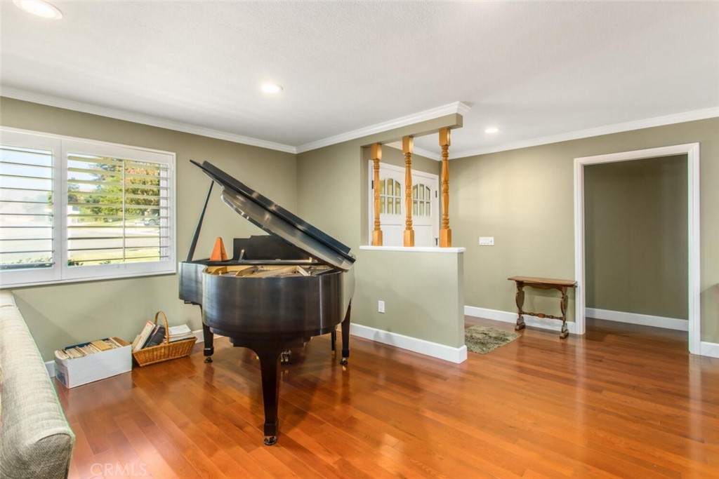 35893 Cornell Drive Yucaipa, CA 92399 - Photo 10 of 39 a living room with furniture and a wooden floor