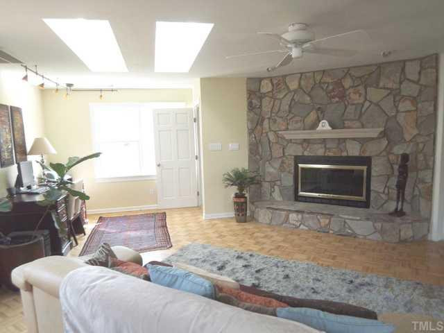 11605 Appaloosa Run West Raleigh, NC 27613 - Photo 6 of 12 HUGE bonus room with stone fireplace and bright skylights. Bonus Room