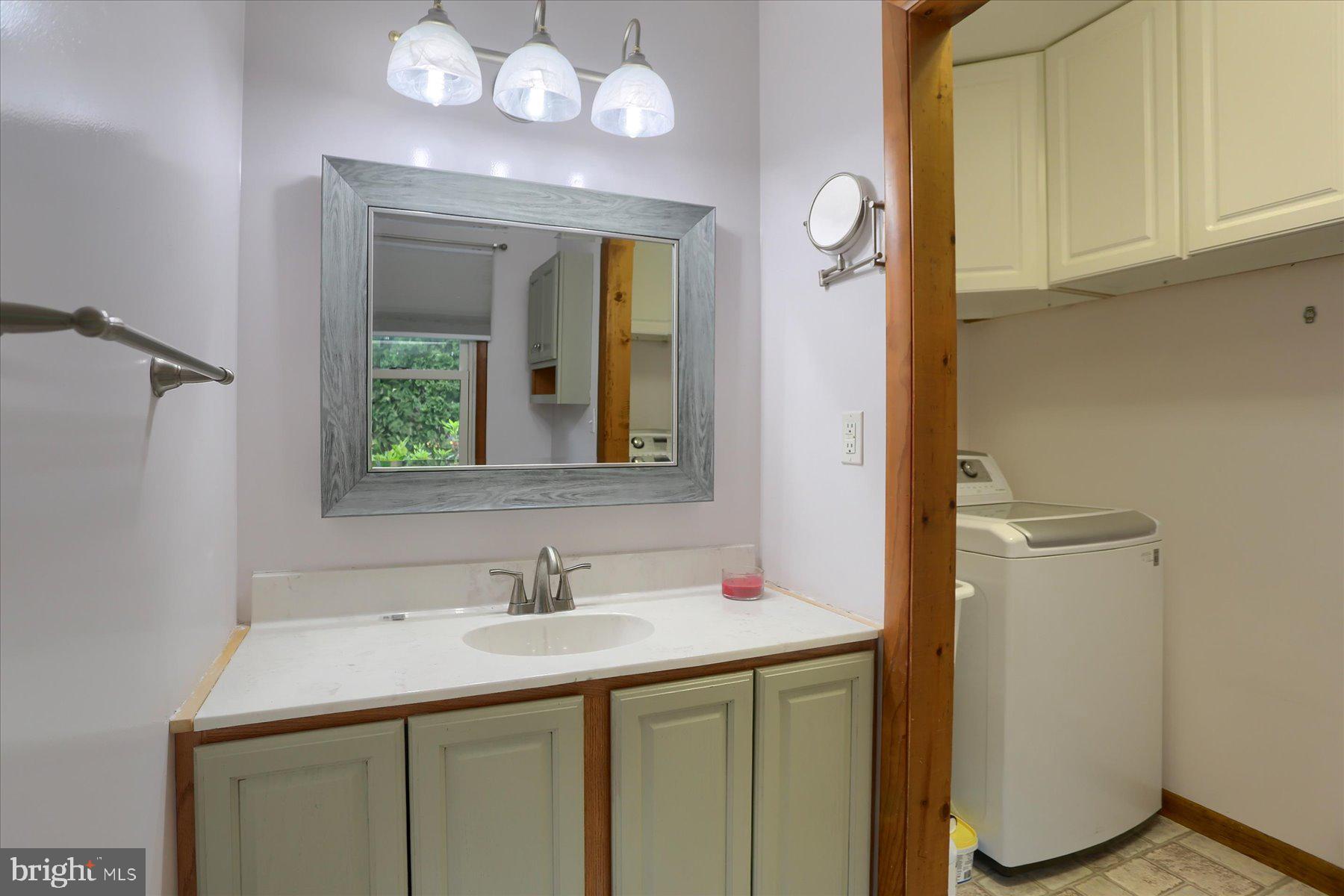 12 South Ridge Road Boiling Springs, PA 17007 - Photo 20 of 39 a bathroom with a sink vanity and a mirror