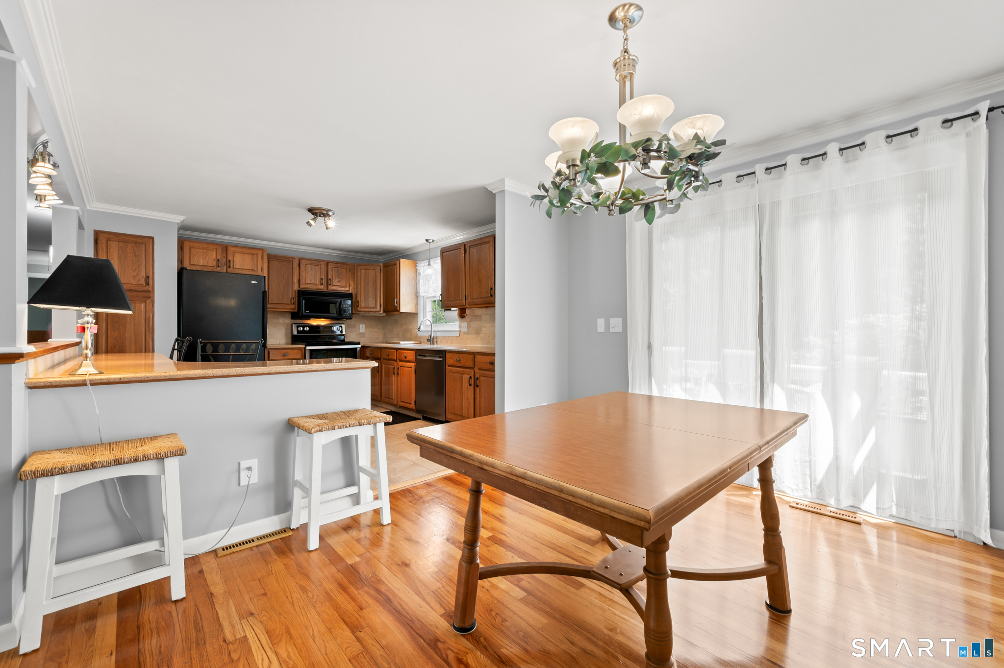 1611 Shepard Avenue Hamden, CT 06518 - Photo 14 of 31 a view of kitchen with furniture and wooden floor