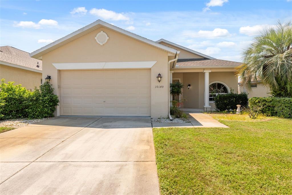 10149 Duffy Circle Weeki Wachee, FL 34613 - Photo 2 of 59 a view of outdoor space and front view of a house