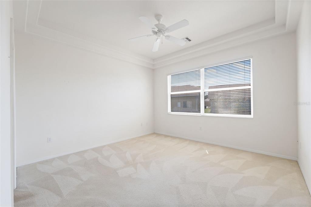 10149 Duffy Circle Weeki Wachee, FL 34613 - Photo 21 of 59 an empty room with windows and closet