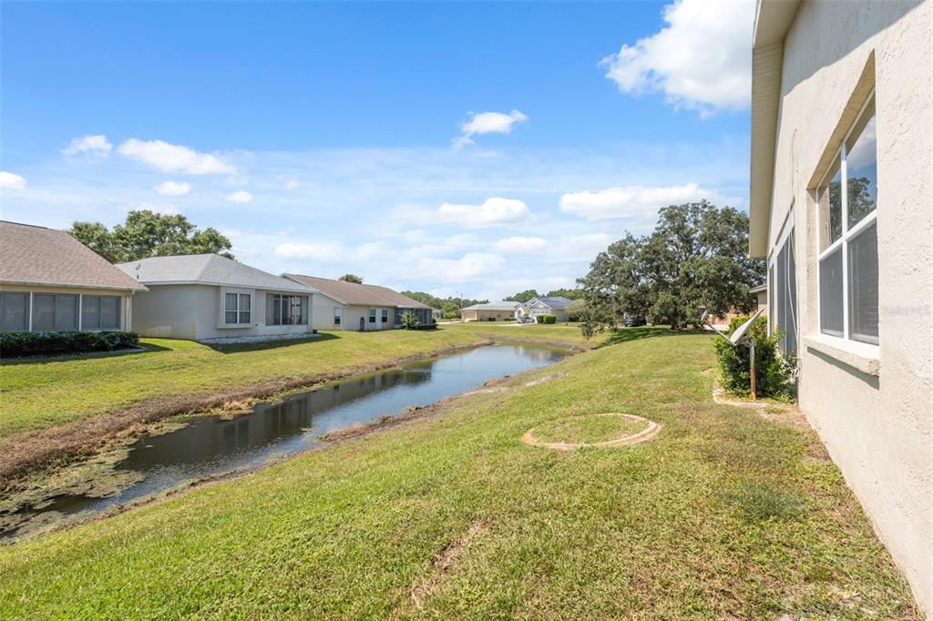 10149 Duffy Circle Weeki Wachee, FL 34613 - Photo 38 of 59 a view of a house with a big yard
