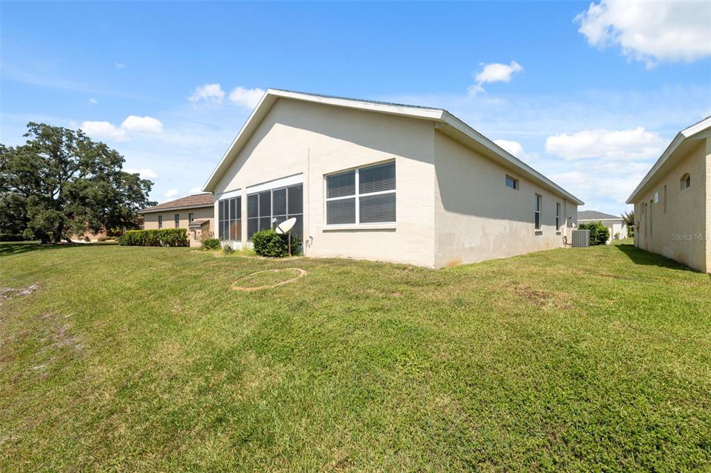 10149 Duffy Circle Weeki Wachee, FL 34613 - Photo 39 of 59 a view of a house with a yard