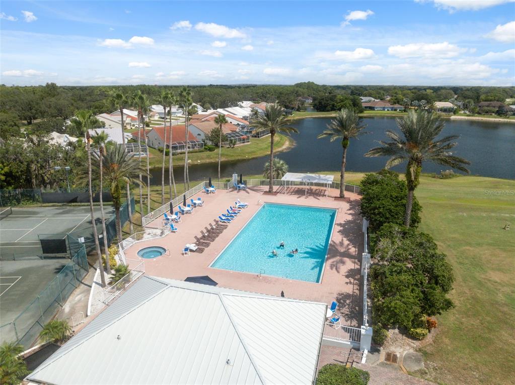 10149 Duffy Circle Weeki Wachee, FL 34613 - Photo 51 of 59 an aerial view of a house with a lake view
