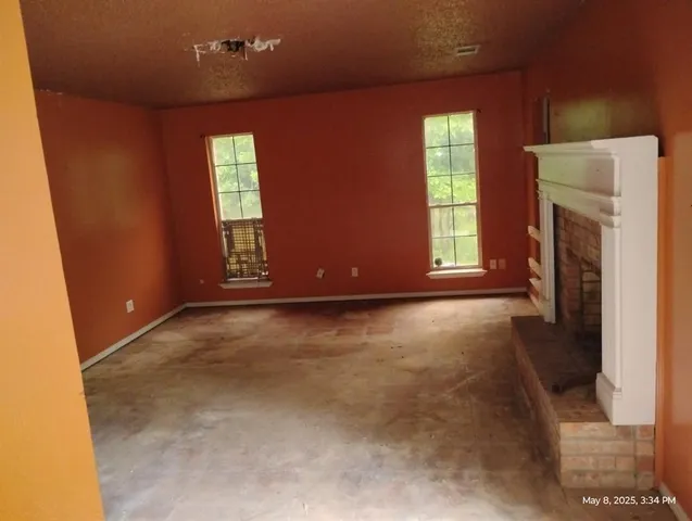 a view of a livingroom with a fireplace