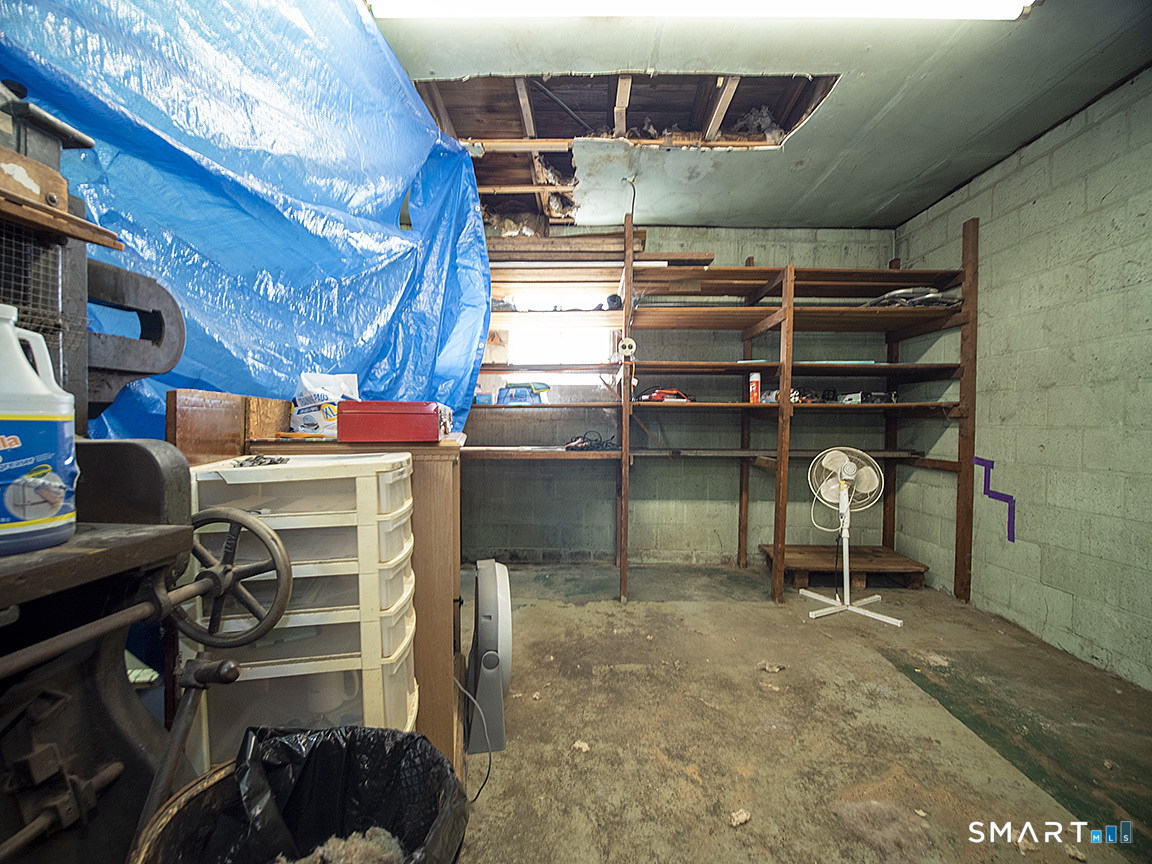 1052 Dixwell Avenue Hamden, CT 06514 - Photo 13 of 25 a storage room