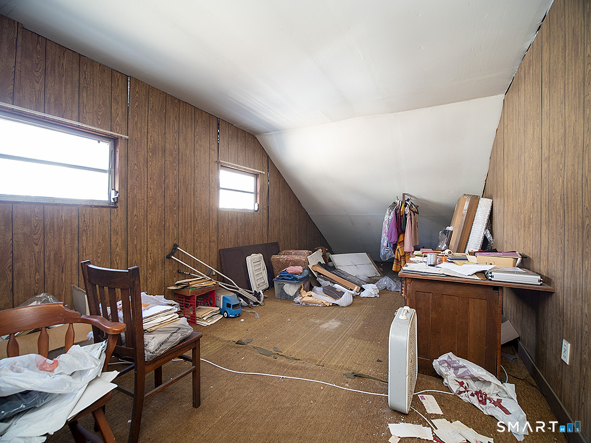 1052 Dixwell Avenue Hamden, CT 06514 - Photo 22 of 25 a room with furniture
