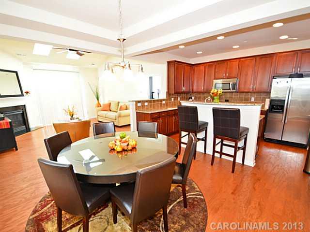 7120 Maricopa Road Charlotte, NC 28277 - Photo 2 of 16 a view of a dining room with furniture window and wooden floor