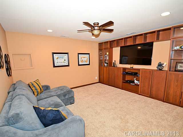 7120 Maricopa Road Charlotte, NC 28277 - Photo 15 of 16 a living room with furniture and a flat screen tv