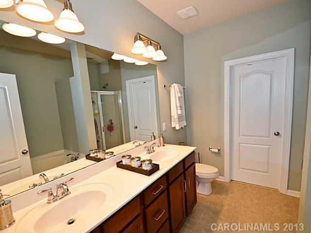 7120 Maricopa Road Charlotte, NC 28277 - Photo 8 of 16 a bathroom with a sink and a mirror