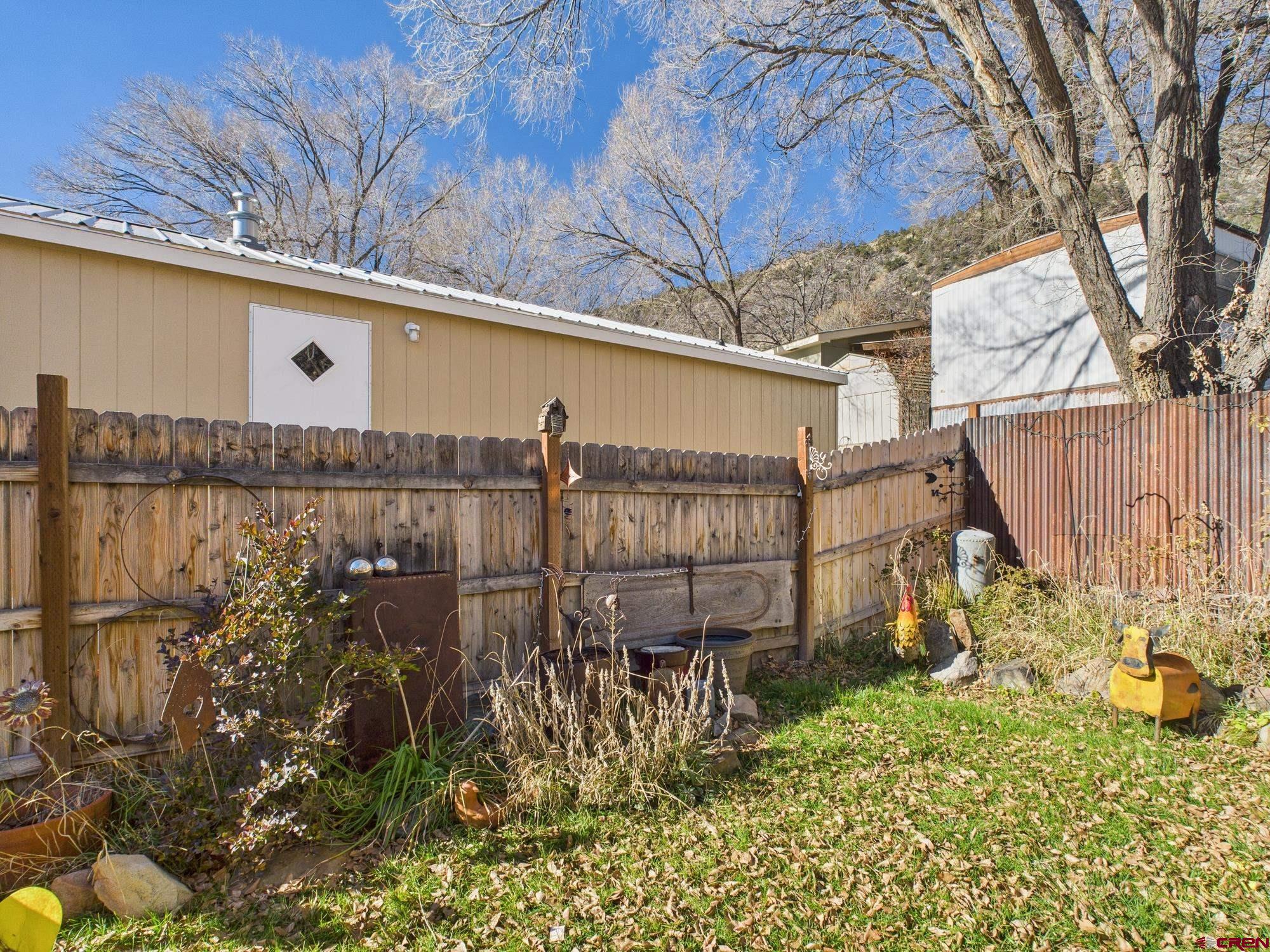 288 Animas View Drive, Unit 9 Durango, CO 81301 - Photo 19 of 20 a view of a pathway of a building