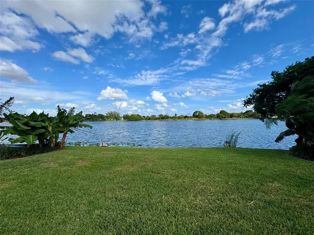 a view of yard with outdoor seating