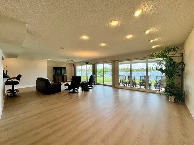a view of an chairs and table in the patio