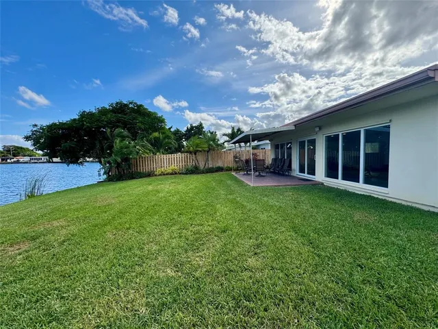 a view of a garden with an ocean