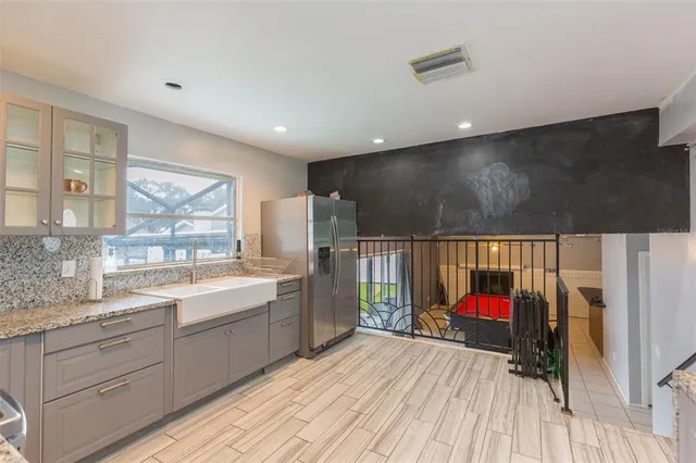 a en suite bathroom with a sink and a mirror