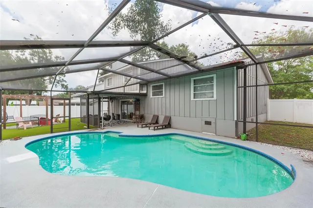 a swimming pool with a yard