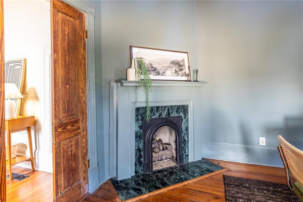 532 Broyles Street Southeast Atlanta, GA 30312 - Photo 14 of 37 a living room with furniture and a fireplace