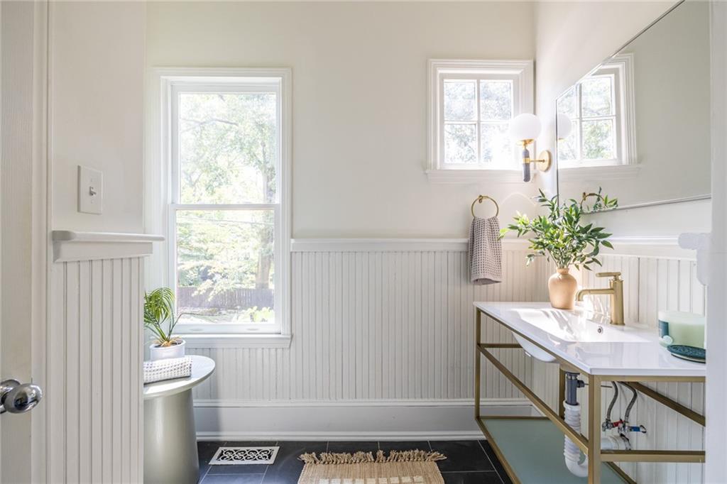532 Broyles Street Southeast Atlanta, GA 30312 - Photo 24 of 37 a view of room with window and wooden floor