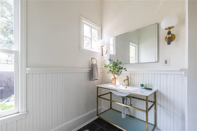 a view of a room that has a table and chair in it