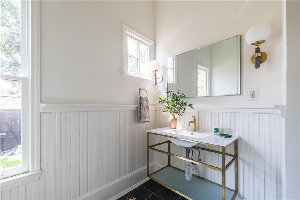 532 Broyles Street Southeast Atlanta, GA 30312 - Photo 25 of 37 a view of a room that has a table and chair in it