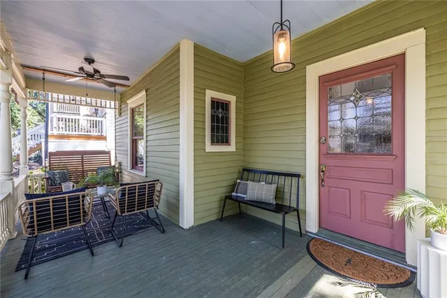 a room that has a dresser and chair