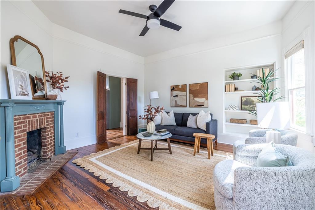 532 Broyles Street Southeast Atlanta, GA 30312 - Photo 8 of 37 a living room with furniture and a fireplace