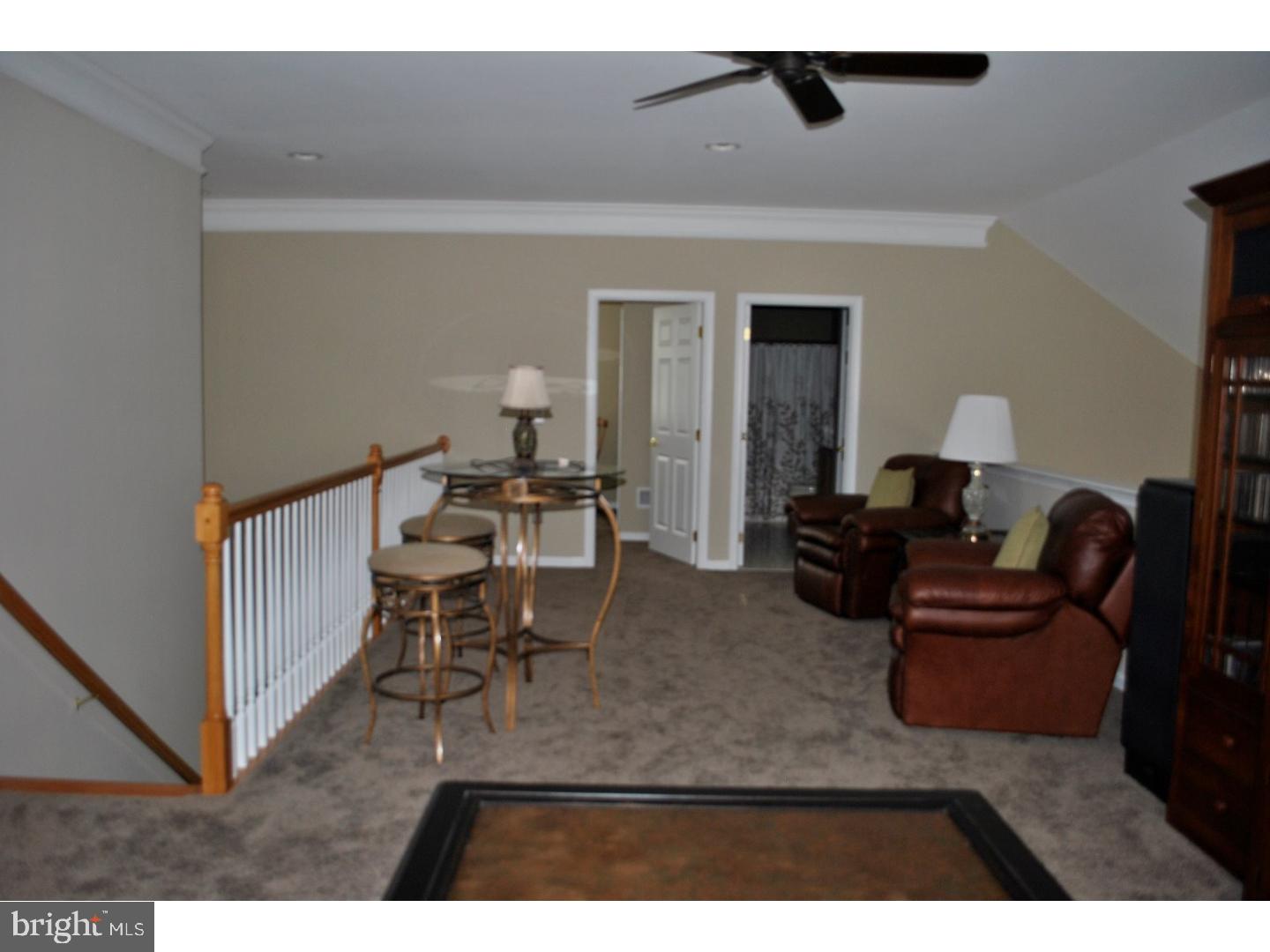 104 Hollins Road Landenberg, PA 19350 - Photo 14 of 17 a living room with furniture and a dining table
