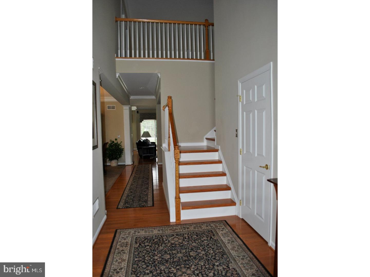 104 Hollins Road Landenberg, PA 19350 - Photo 5 of 17 a view of a hallway with staircase