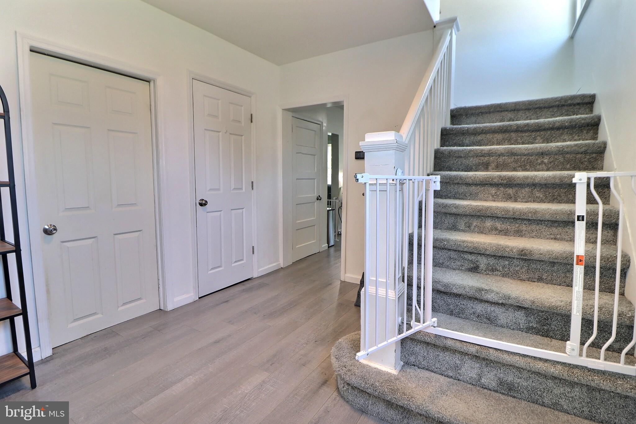 1022 Penn Line Road Paulsboro, NJ 08066 - Photo 3 of 19 a view of a hallway with wooden floor and entryway