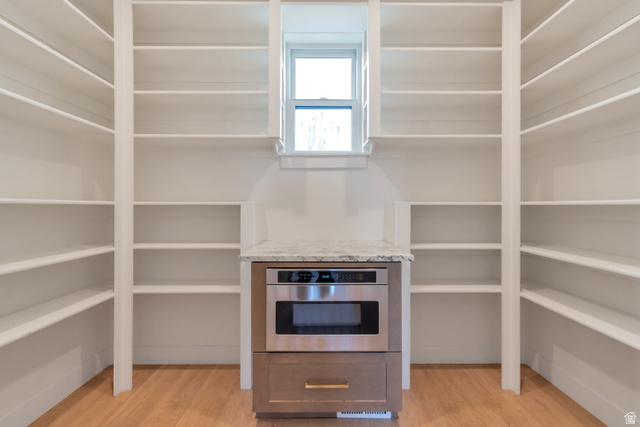 1820 West Farmhouse Flats Road Peoa, UT 84061 - Photo 19 of 79 Built-in shelving flanking a microwave drawer and single window
