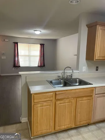 a close view of sink and mirror