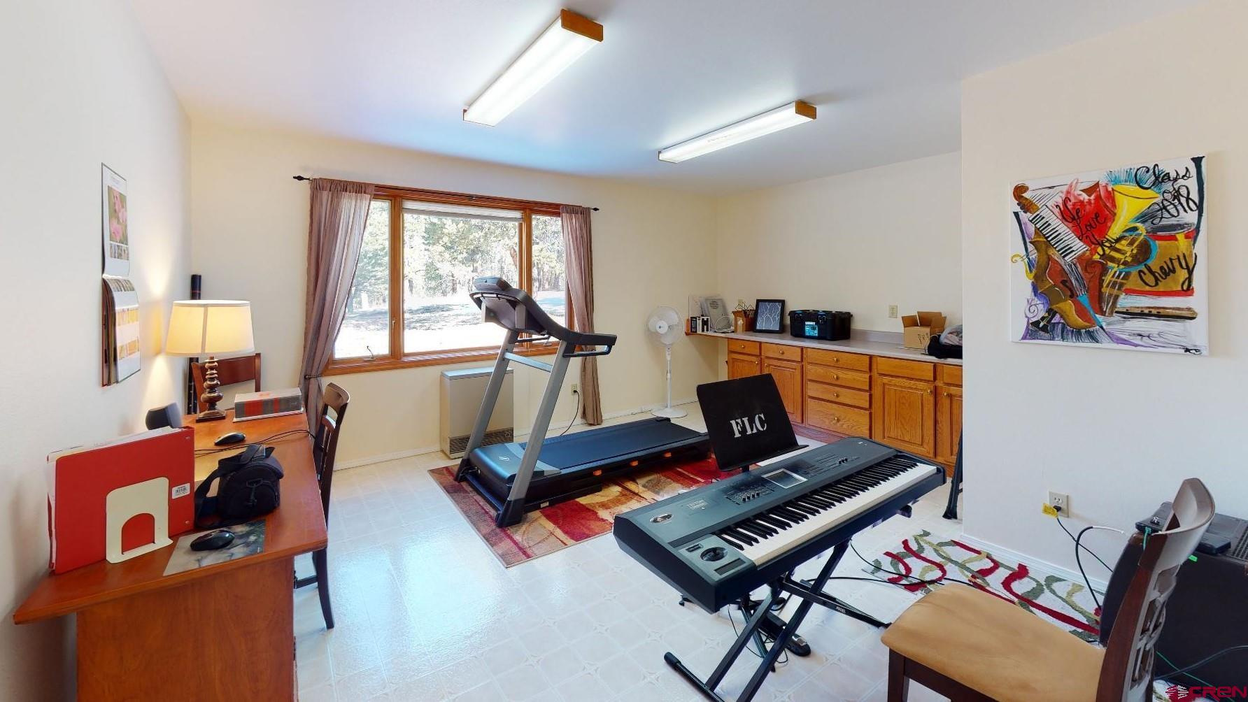 84 Ridge Road Durango, CO 81303 - Photo 11 of 33 a room with furniture and a window