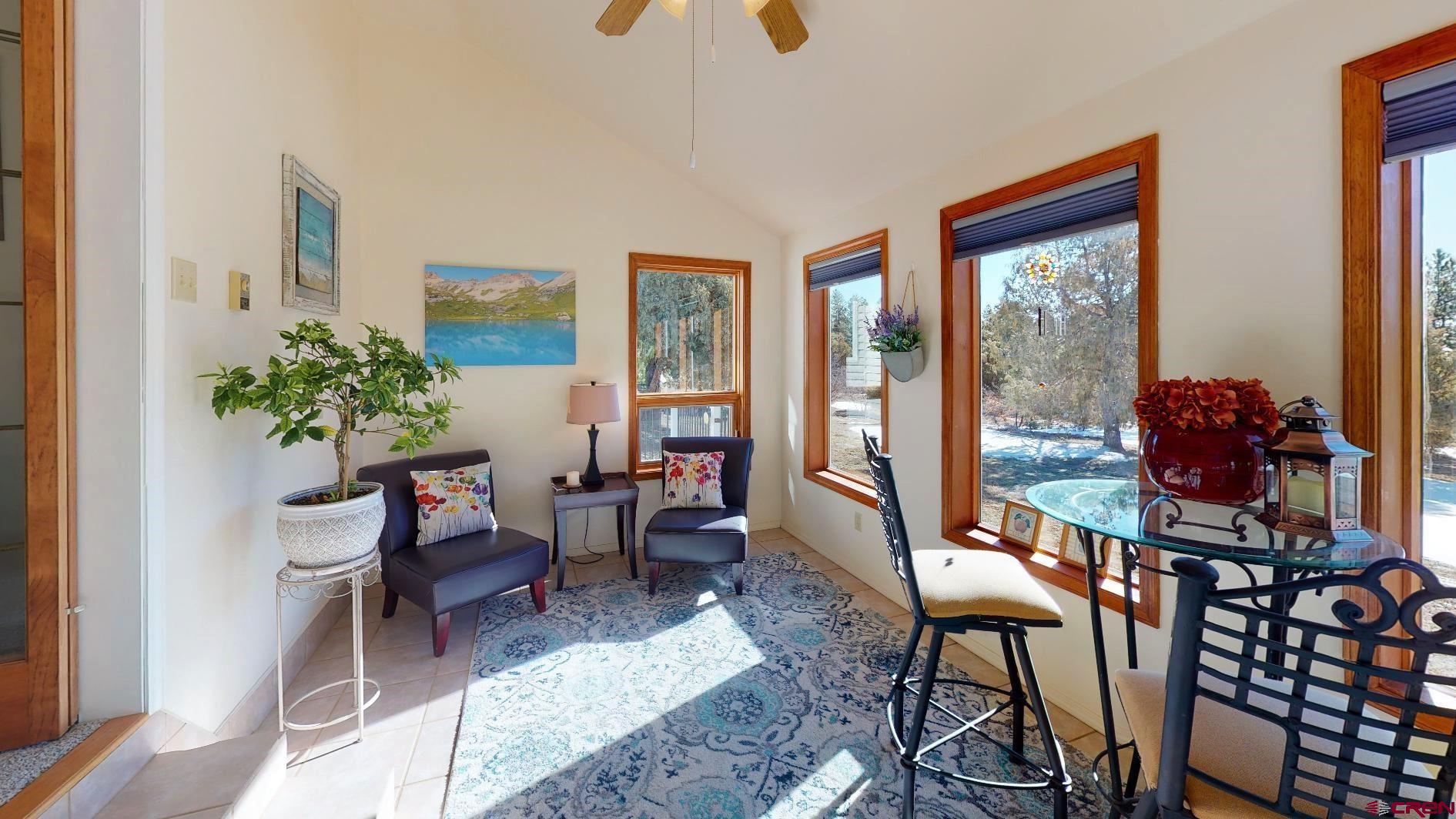 84 Ridge Road Durango, CO 81303 - Photo 6 of 33 a living room with furniture and a potted plant