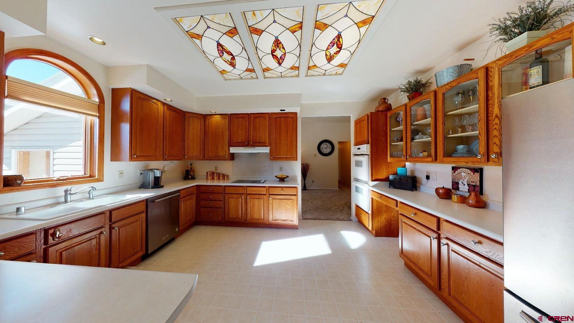 84 Ridge Road Durango, CO 81303 - Photo 9 of 33 a large kitchen with stainless steel appliances lots of counter top space