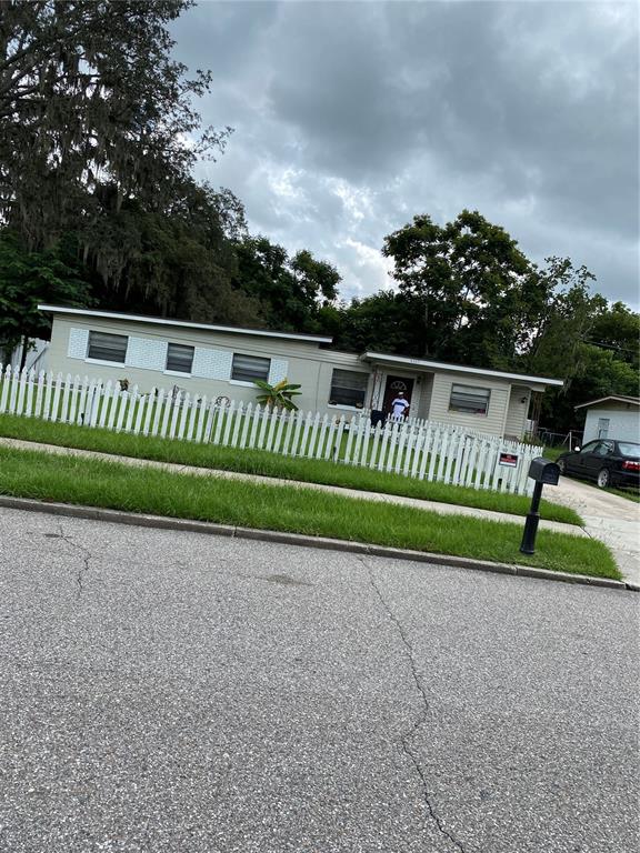 a view of backyard with green space