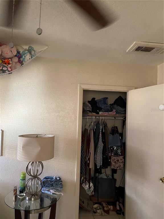 4207 Meadowbrook Avenue Orlando, FL 32808 - Photo 11 of 13 a view of walk in closet