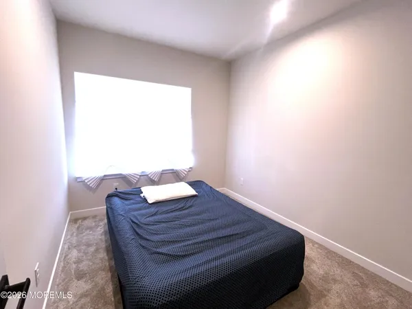 a view of a room with a window