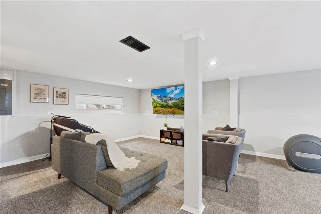 8180 Manning Road Germantown, OH 45327 - Photo 21 of 39 This versatile basement offers a bright and comfortable area for relaxation and entertainment.
