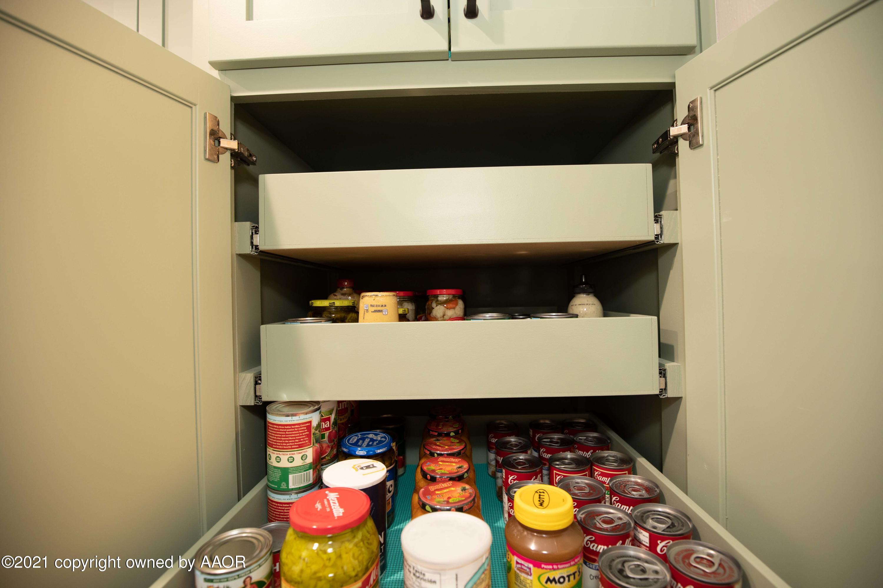 6127 Belpree Road Amarillo, TX 79106 - Photo 37 of 63 KITCHEN PULLOUTS