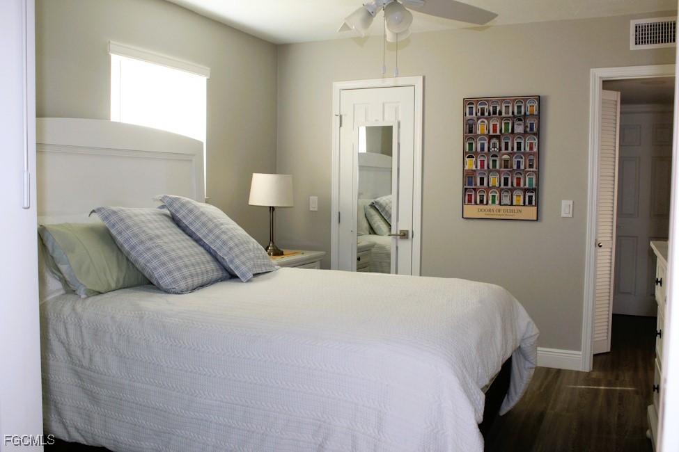 16881 Davis Road, Unit 112 Fort Myers, FL 33908 - Photo 11 of 15 a bedroom with a bed and a window