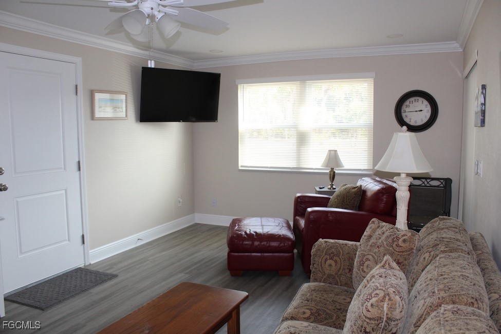 16881 Davis Road, Unit 112 Fort Myers, FL 33908 - Photo 5 of 15 a living room with furniture and a flat screen tv