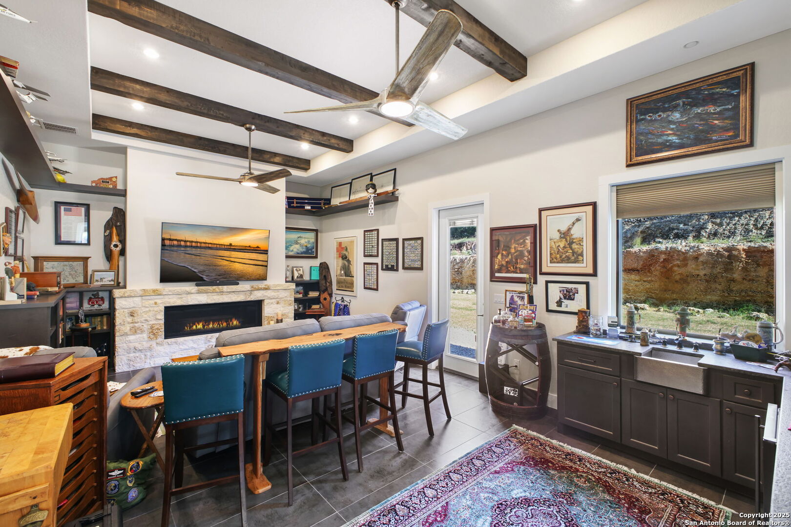 1023 Comanche Ridge New Braunfels, TX 78132 - Photo 29 of 109 a dining hall with stainless steel appliances granite countertop a stove and a dining table