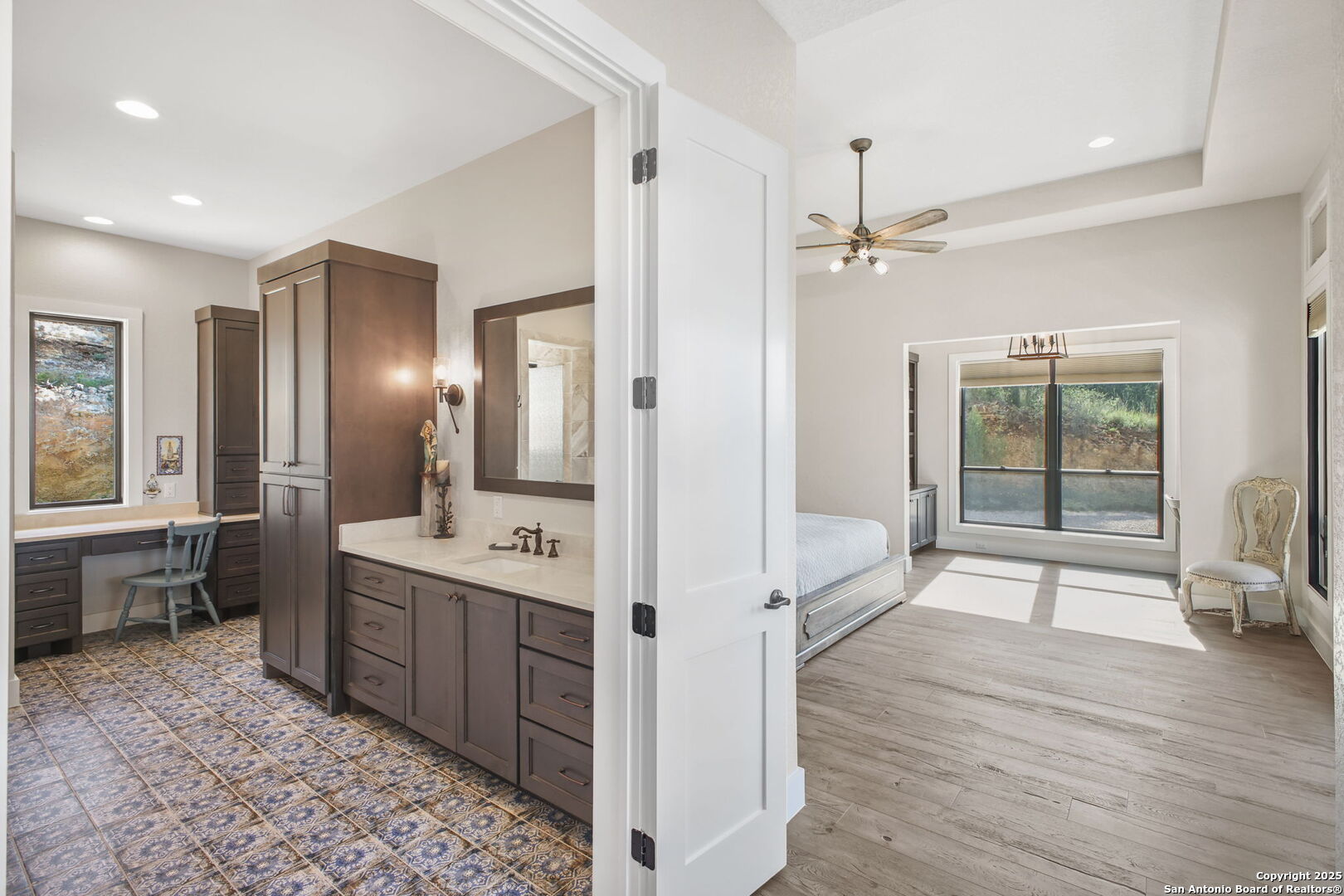 1023 Comanche Ridge New Braunfels, TX 78132 - Photo 34 of 109 a large spacious bathroom with a double vanity sink a large mirror and a shower