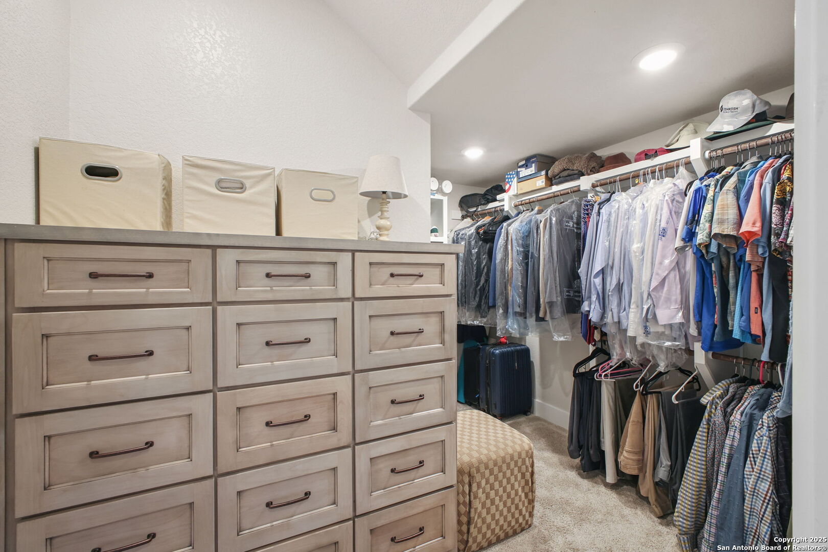 1023 Comanche Ridge New Braunfels, TX 78132 - Photo 40 of 109 a view of walk in closet with clothes
