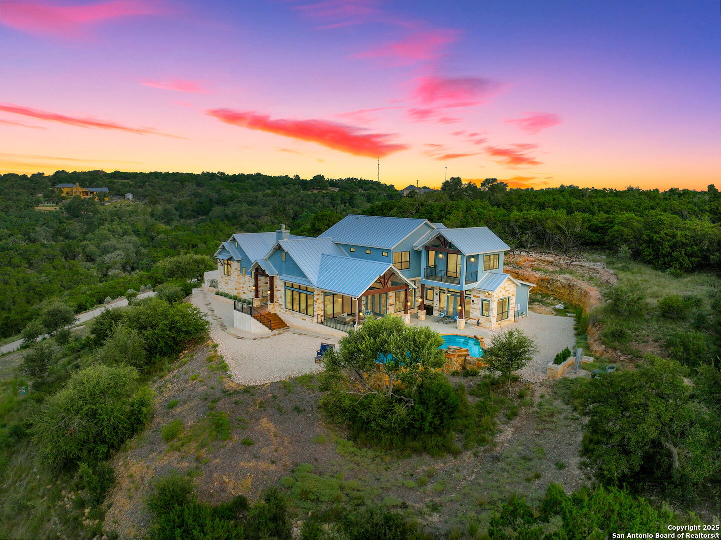 1023 Comanche Ridge New Braunfels, TX 78132 - Photo 4 of 109 a view of a big house with a big yard